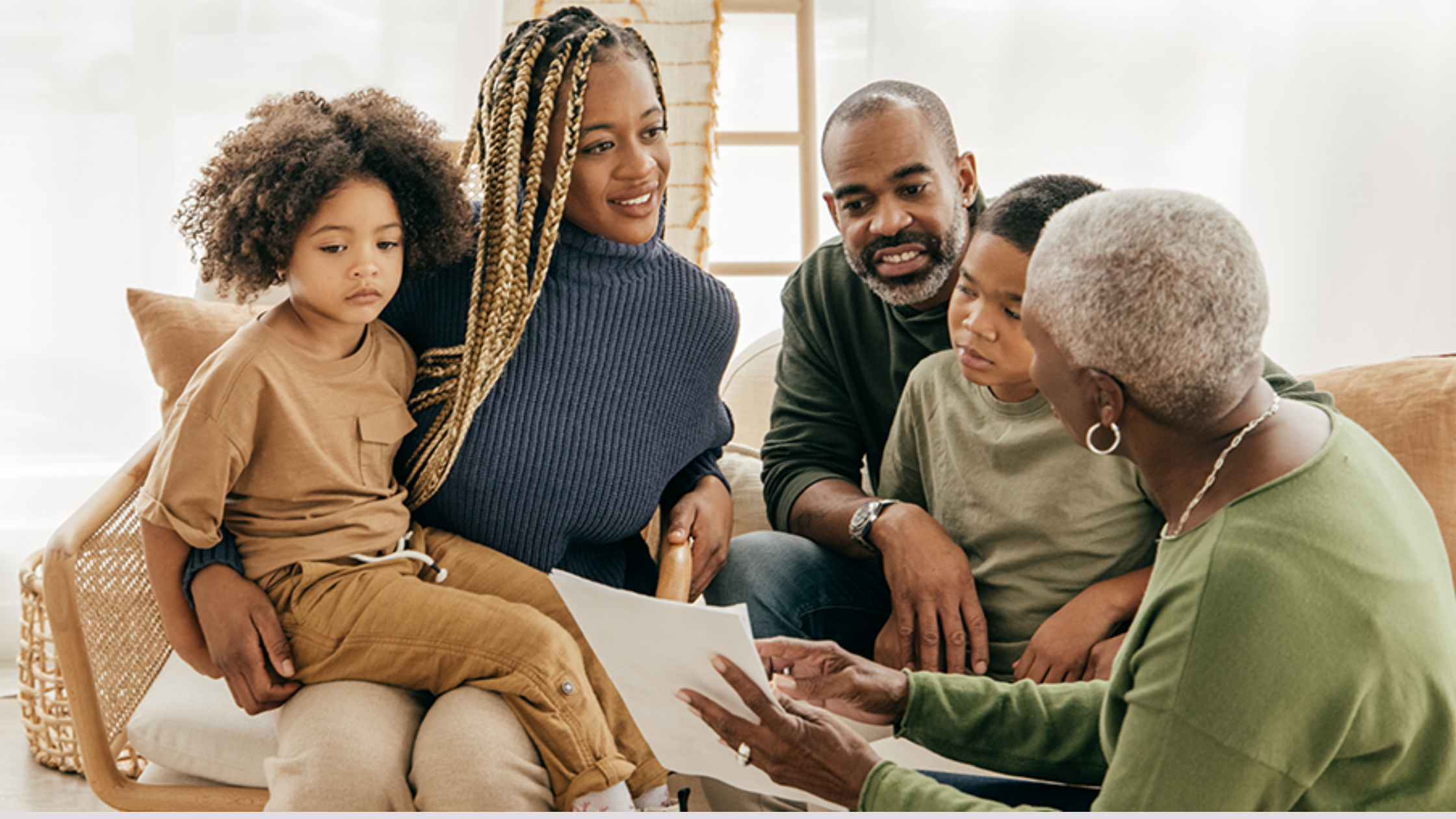 Family sitting with a lawyer discussing estate plan