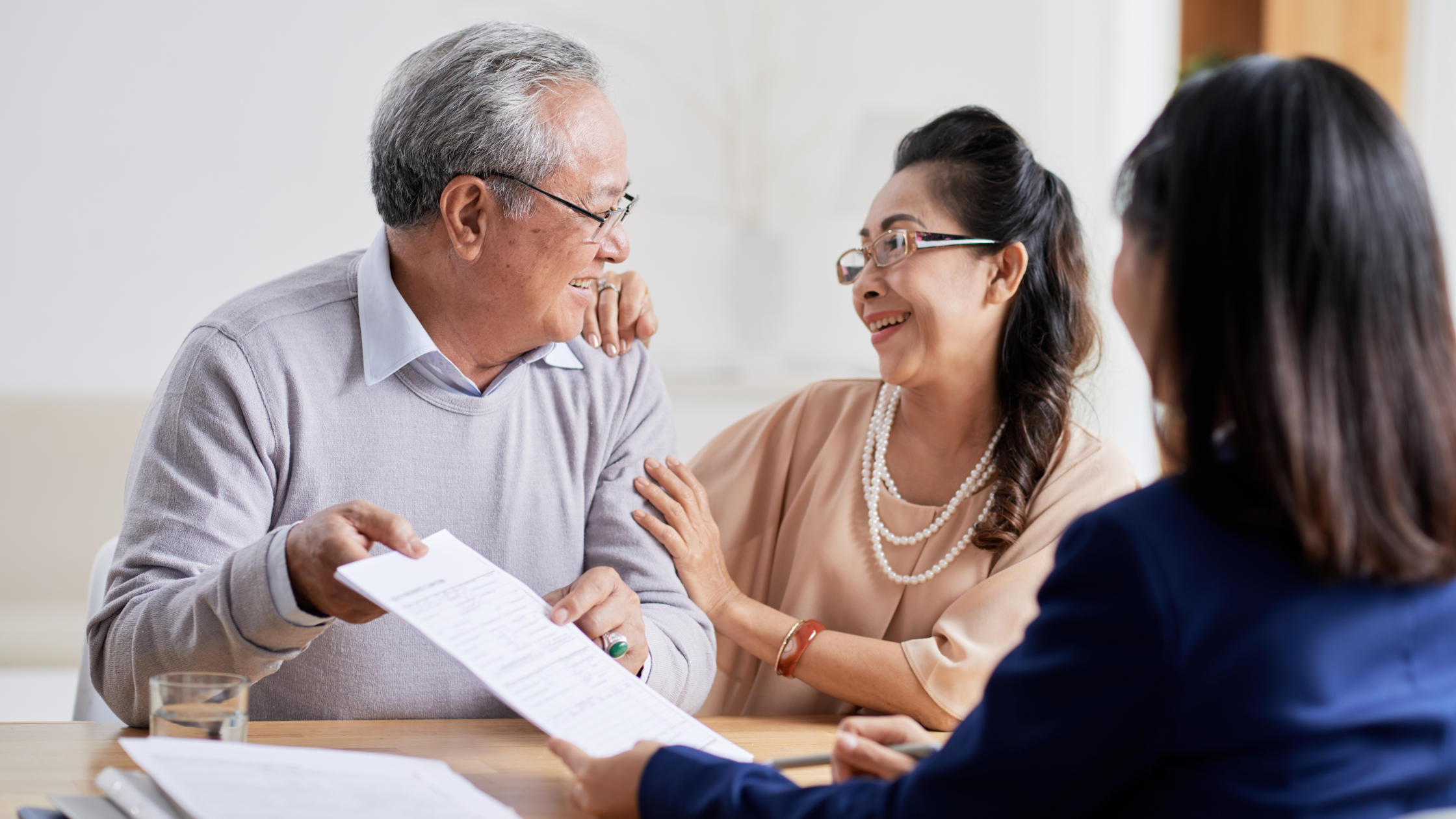 Couple updating their estate plan with a lawyer